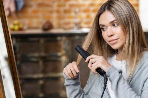 Must i select a ceramic or a titanium hair straightening iron?